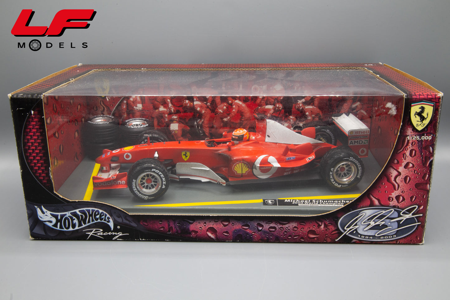 modellino ferrari f2003-ga schumacher world champion hot wheels 1:18 scatola