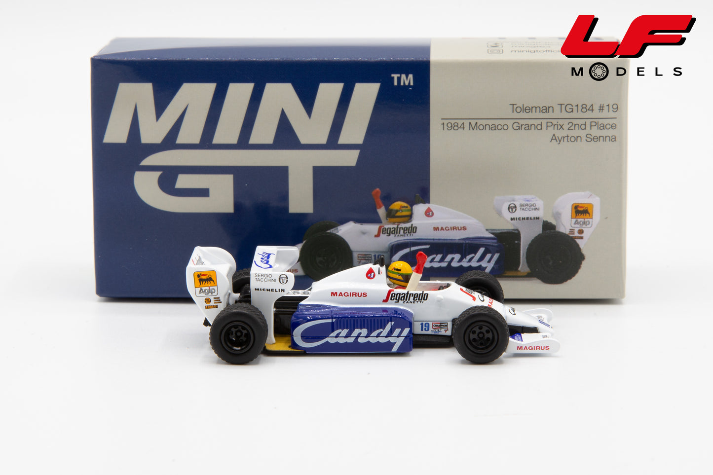 modellino toleman tg184 monaco gp ayrton senna mini gt 1:64 MGT01118-L vista laterale
