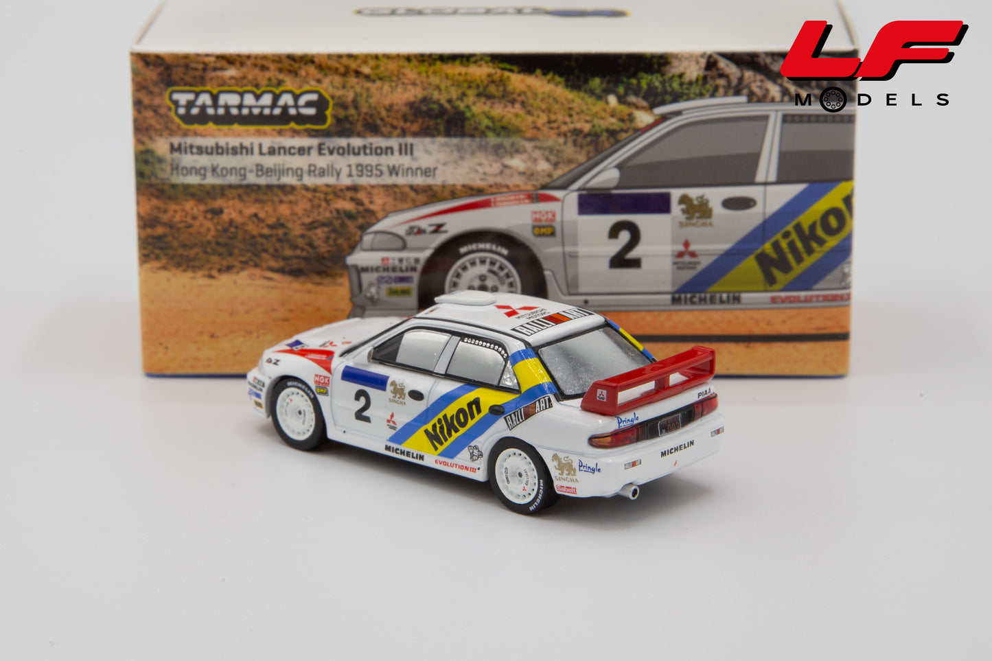 modellino mitsubishi lancer evo III rally tarmac 1:64
