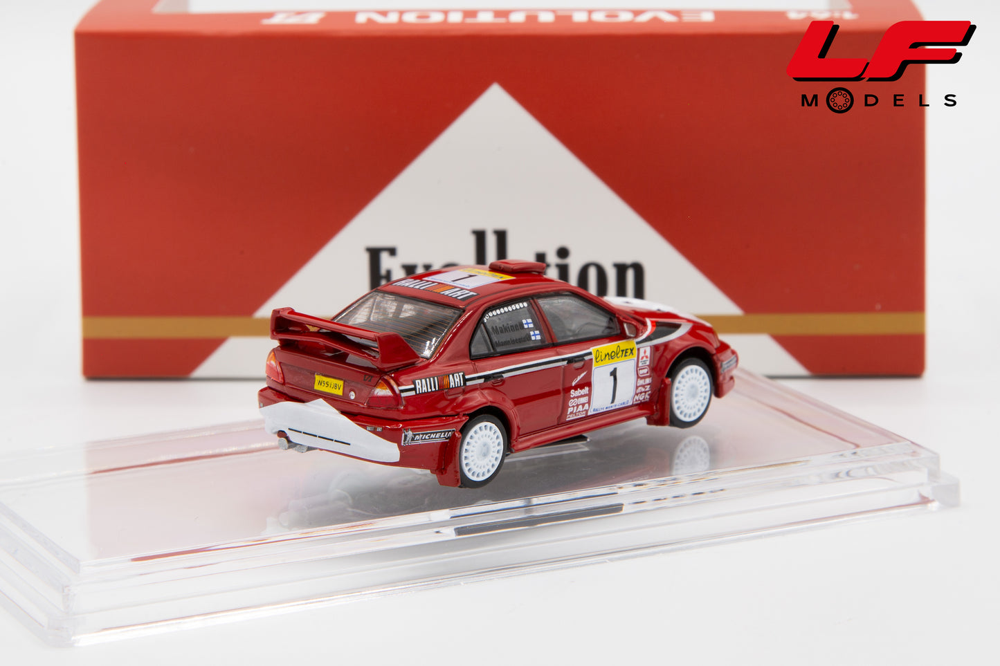 modellino mitsubishi lancer evo vi win car of the rally montecarlo 1999 bm creations 1:64 BM64B0410 vista posteriore