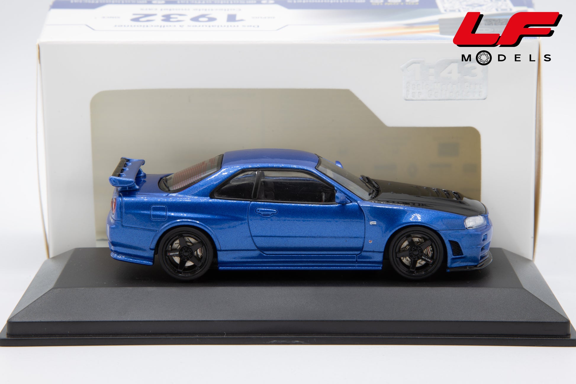 modellino nissan skyline gt-r bnr34 with nismo parts blu solido 1:43 4318202 vista laterale