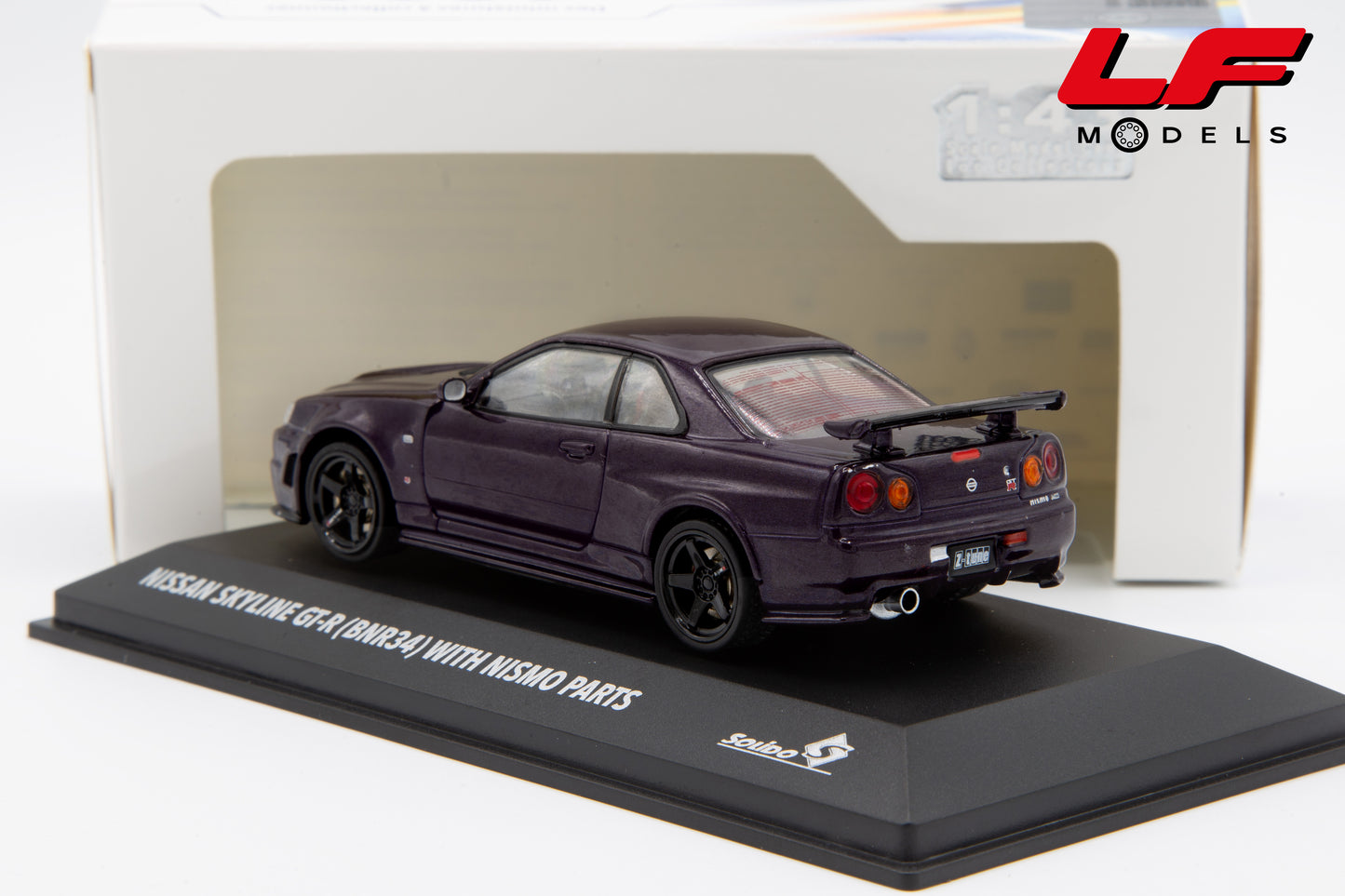 modellino nissan skyline gt-r bnr34 with nismo parts midnight purple solido 1:43 4318201 vista posteriore