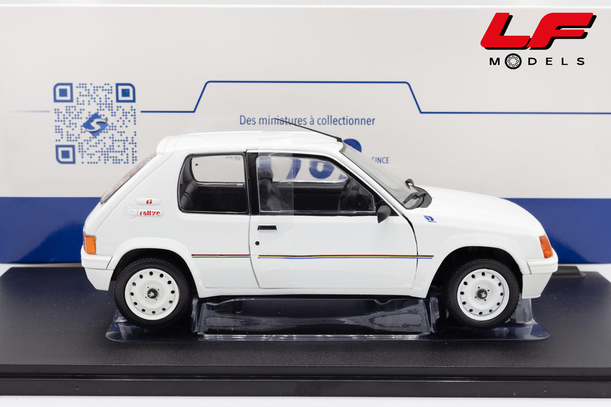 modellino peugeot 205 1.3 rally solido 1:18 1801701 vista laterale