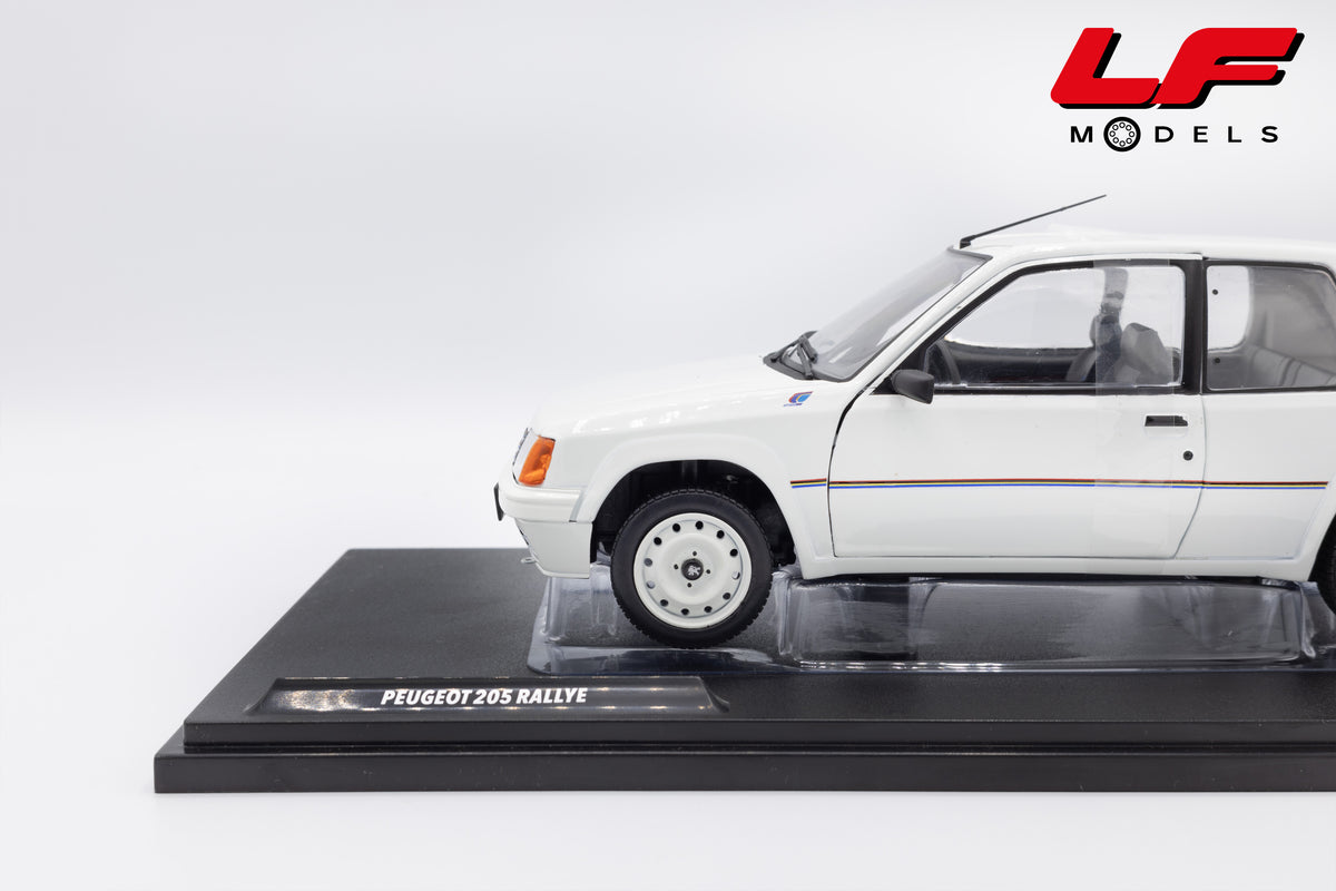 modellino peugeot 205 1.3 rally solido 1:18 1801701 vista laterale