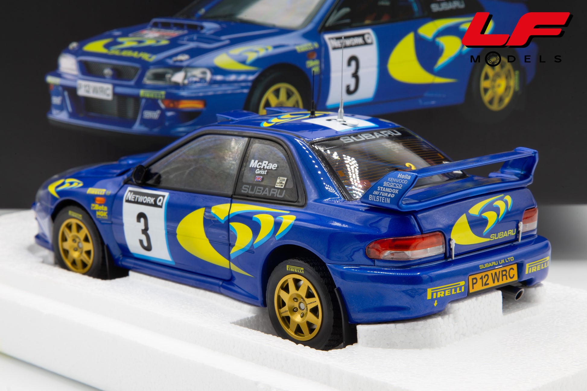 modellino subaru impreza rally rac lombard sunstar 1:18 5781 vista posteriore